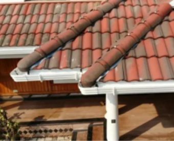 Residential building with gutters